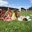 Séance massages à la crème solaire